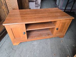 lot 14 image: Wooden Entertainment Center with Storage Approx. 41.5 wide x 22 deep x 19 high