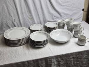 lot 61 image: Vintage Porcelain Dinnerware Set with Floral Design