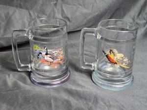 lot 69 image: Set of 2 Wildlife Themed Glass Beer Steins