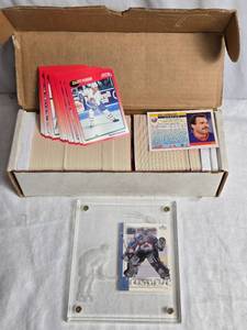 lot 114 image: Hockey Cards with Patrick Roy Plaque, Box of 1991 Score NHL Uncounted or Sorted