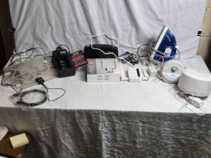 lot 136 image: Assorted Electronics and Accessories Bundle - Antenna, Rayovac Battery Charger, Natures Soothing Sounds Machine, M106 Verizon Wireless Adapter