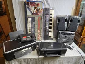 lot 178 image: Assorted Electronics Lot Casio Keyboard, Audio System, Printers, and Uniden Device