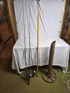 lot 182 image: Fishing Rods with Reels and a Metallic Stand Including Vintage Telescoping Zip-Pole
