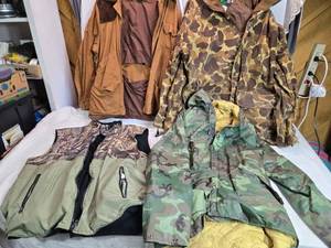 lot 232 image: Collection of Outdoor Jackets and Vests - 4 Pieces