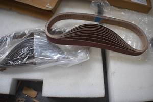 lot 54 image: 120-Grit  1 x 30-Inch Sanding Belt Sandpaper (10 Pack) and 400 grit 10 pack.