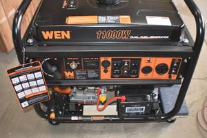 lot 74 image: WEN DF1100T 11,000-Watt 120V240V Dual Fuel Portable Generator with Wheel Kit and Electric Start