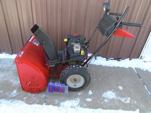 Yard Machine 826 snow blower with electric start. Good heavy duty unit. Tested & works. As shown.