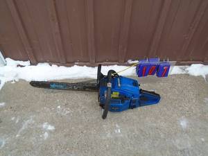 Blue Max gas chainsaw with spare bar. Tested & runs. As shown.