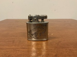 lot 92 image: Engraved lighter, Japan