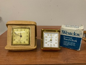 lot 98 image: Two travel clocks