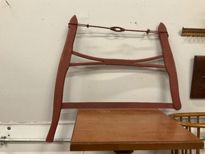 lot 24 image: Hand Saw with wooden handle.