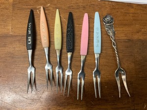lot 81 image: 7 pickle forks, Las Vegas, Texas and more