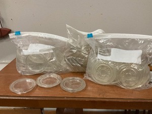 lot 80 image: Quantity of glass lids including Anchor Hocking, Ball, Atlas and more.