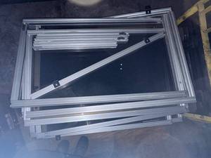 lot 4 image: Collection of 8020 Aluminum Framed Glass Panels 27 x 48 (10 panels) with 24 Extra Pieces