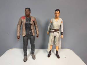 lot 34 image: Set of 2 Star Wars Action Figures - Rey and Finn