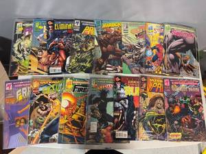 lot 55 image: Collection of 15 Vintage Nalibu Superhero Comics from the 1990s