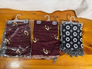 lot 133 image: Set of 2 Cleveland Cavaliers and Boston Celtics Scarves (never worn)