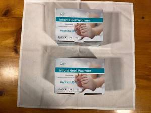 lot 143 image: 2 Boxes of Infant Heel Warmers (25 Count Each)