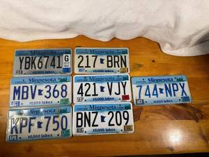lot 149 image: Collection of 7 Minnesota License Plates