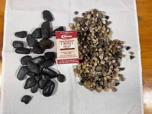 lot 150 image: Collection of River Rocks and Sterno SMores Heat Pack
