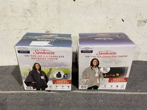 lot 134 image: LOT OF 2 Sunbeam On The Go Cordless Heated Throw