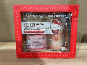 lot 428 image: The Creme Shop Hello Kitty Vanilla Spa Bath Crystals 12.36 oz Sugar Body Scrub 14.1 oz All Ages