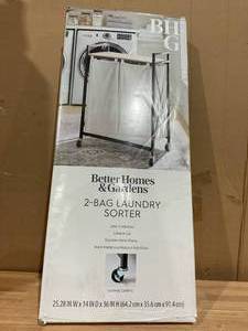 lot 443 image: Better Homes & Gardens Jace Metal Frame Laundry Sorter Cart with White Fabric Bins