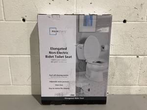 lot 541 image: Mainstays Elongated Non-Electric Bidet Toilet Seat with Dual Self-Cleaning Nozzles, Daisy White