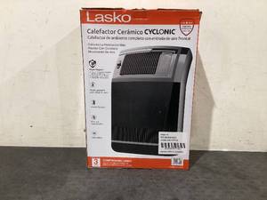 lot 703 image: Lasko 1500W Cyclonic Ceramic Console Electric Space Heater with Timer, CC24925, Black, New