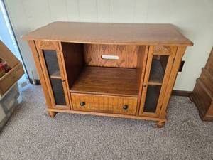 lot 4 image: Wooden Entertainment Center with Glass Cabinet Doors