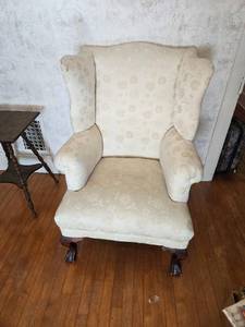 lot 9 image: Vintage Wingback Armchair with Floral Upholstery
