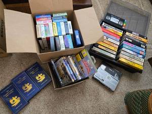 lot 41 image: Assorted Collection of VHS Tapes and DVDs