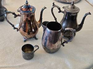 lot 100 image: Vintage Wm. Rogers Silverplate Tea Pots,  Creamer and Small Cup