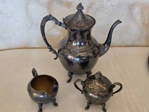 lot 101 image: Vintage Silver on Copper Tea Set with Teapot, Sugar Bowl, and Creamer
