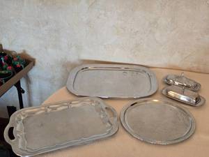 lot 103 image: Silver Plated Serving Trays and Butter Dishes
