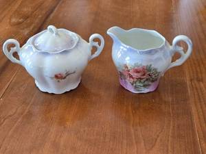 lot 107 image: Vintage Porcelain Creamer and Sugar Bowl Set with Rose Motif