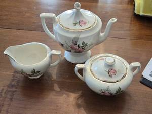 lot 108 image: Vintage 3-Piece Porcelain Tea Set with Floral Design