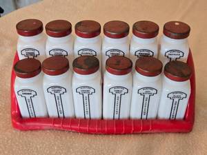 lot 112 image: 12 Griffiths Vintage Spice Jars with Red Holder