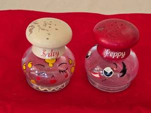 lot 128 image: Vintage T.C.W. Co Salty and Peppy Glass Shakers