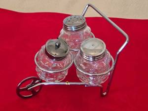 lot 132 image: Vintage Glass Salt and Pepper Shaker Set with Wheel Barrow Caddy