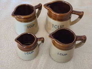 lot 168 image: Set of 4 Ceramic Measuring Cups in Varied Sizes
