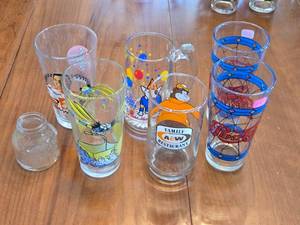 lot 330 image: Collection of 7 Assorted Character Glasses with Logos - Pepsi, A&W, Nascar, Taco Bell