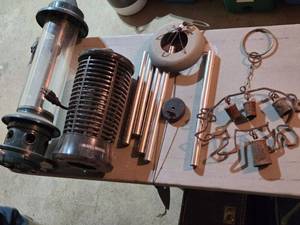 lot 392 image: Bug Zappers, Bird Feeder, Wind Chime
