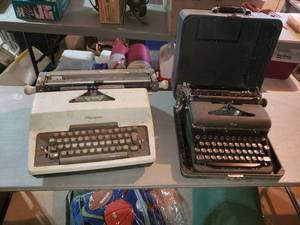 lot 406 image: Lot of 2 Vintage Typewriters Olympia De Luxe and Royal Portable