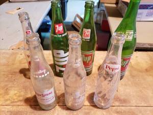 lot 441 image: Collection of 7 Vintage Soda Bottles 7Up, Pepsi, Rock Spring, and More