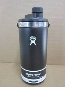 lot 105 image: Hydro Flask 128 oz. Oasis Water Jug Stainless Steel, Reusable, Vacuum Insulated Leak Proof Cap,Black - Scratch and Dent - Used