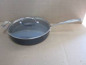lot 128 image: All-Clad HA1 Hard Anodized Nonstick Saut Pan 4 Quart Induction Oven Broiler Safe 500F Pots and Pans, Cookware Black - Scratches on Pan and Small Dents on Lid.