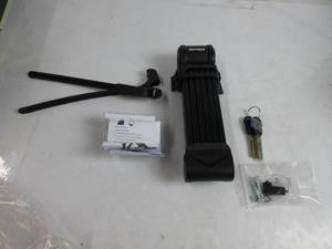 lot 45 image: Kryptonite Keeper 510 Folding Bike Lock, Compact Lightweight High Security Anti-Theft Foldable Bicycle Lock with 2 Keys and Mount for E-Bikes Scooter Road Mountain Bikes, 100cm (39in),Black NO PACKAGING, SLIGHTLY USED, EVERYTHING IS THERE