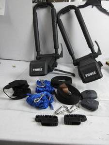 lot 55 image: Thule Hull-a-Port XTR - Kayak j-style roof rack - Carry up to 2 kayaks - Folds flat - Pre-assembled - Locks to roof rack - Universal mounting up to 80.5mm wide load bars SLIGHTLY USED, KEYS NOT INCUDED