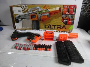 lot 57 image: Nerf Ultra Select Fully Motorized Blaster, Fire for Distance or Accuracy, Automatic Electric Full Auto Toy Foam Blasters NOT TESTED, NO BATTERIES, MISSING 1 DISTANT NERF DARTS, ONLY 9 DISTANT & 10 ACCURACY PRECISION DARTS, USED